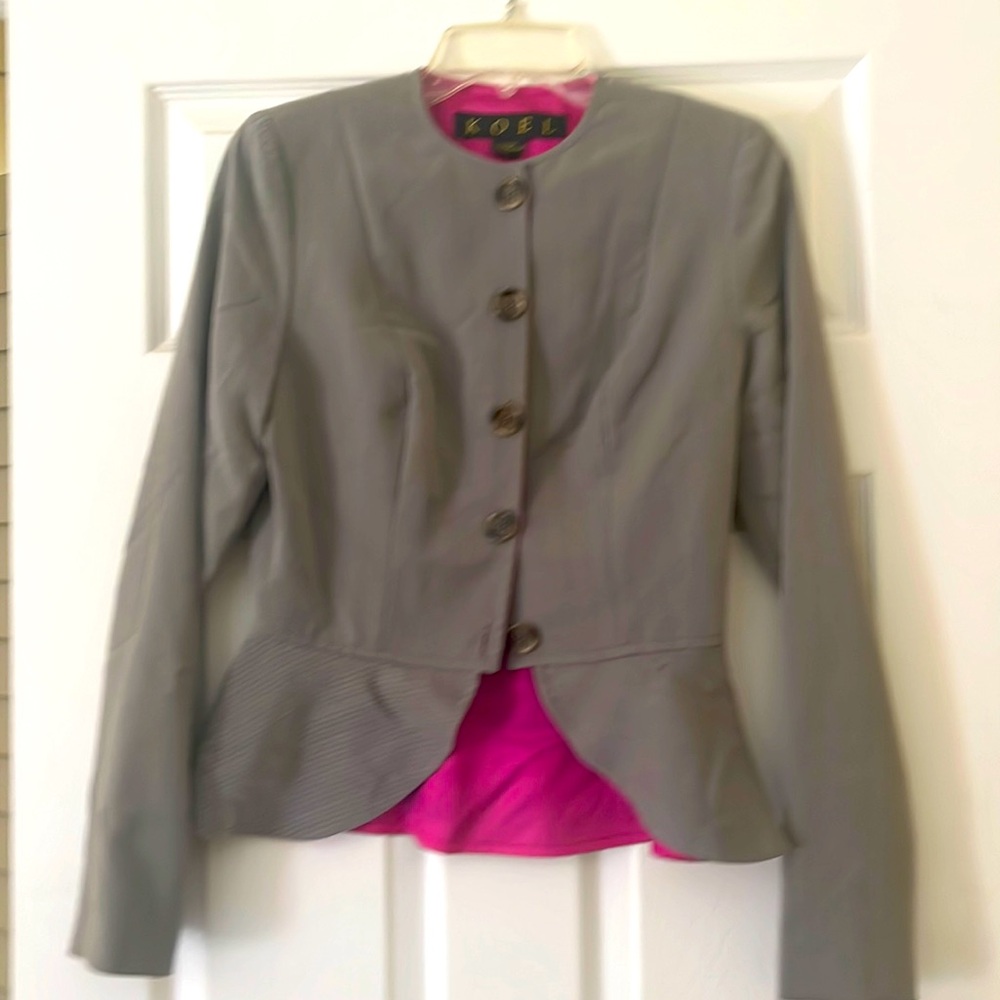 NWOT KOEL small.. Asymmetrical jacket. Pink and black linings. Button front